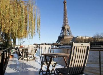 This Houseboat Airbnb Is As Close As You’ll Get To An Eiffel Tower Sleepover