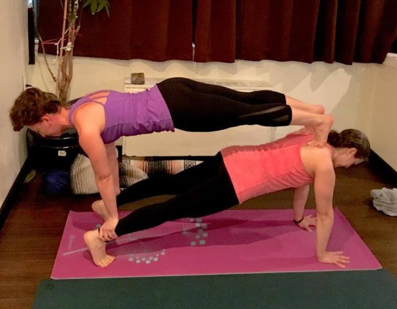 The benefits of partner yoga poses – SheKnows