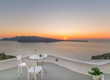 Enjoy A Seaside Sunset View From This Cave Airbnb In Santorini
